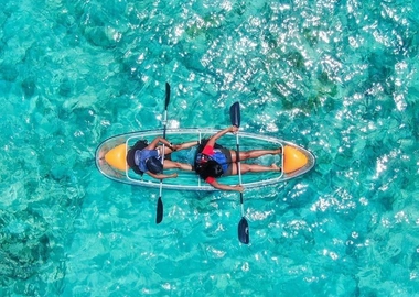 Clear kayak raft 2 orange paddles