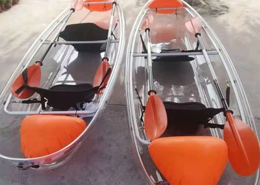 Clear kayak raft 2 orange paddles