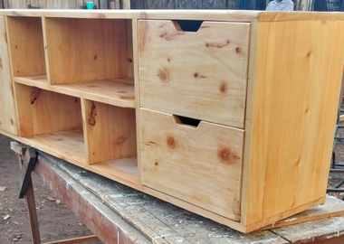 Wooden TV stand with open shelves