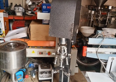 Metal capping machine