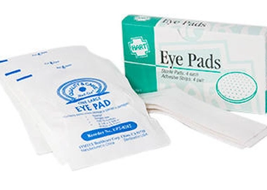 Eye pads with adhesive