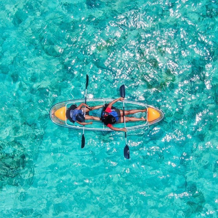 Clear kayak raft 2 orange paddles