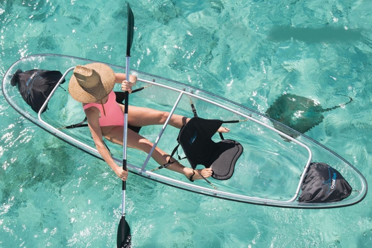 Clear kayak raft 2 orange paddles