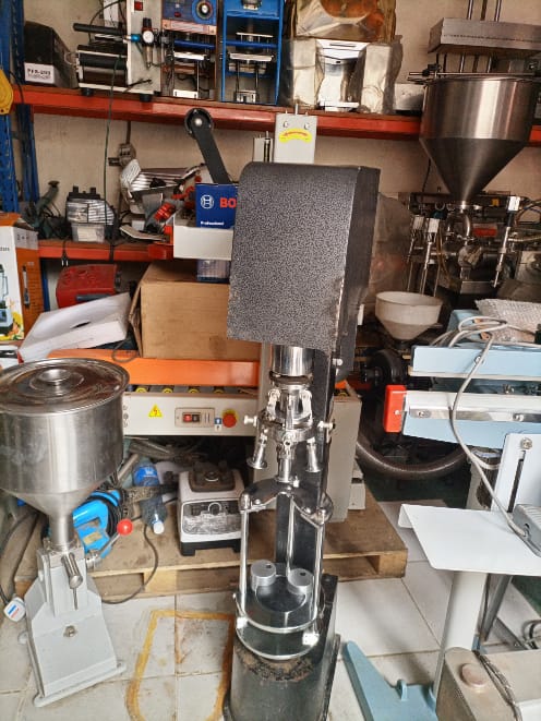 Metal capping machine